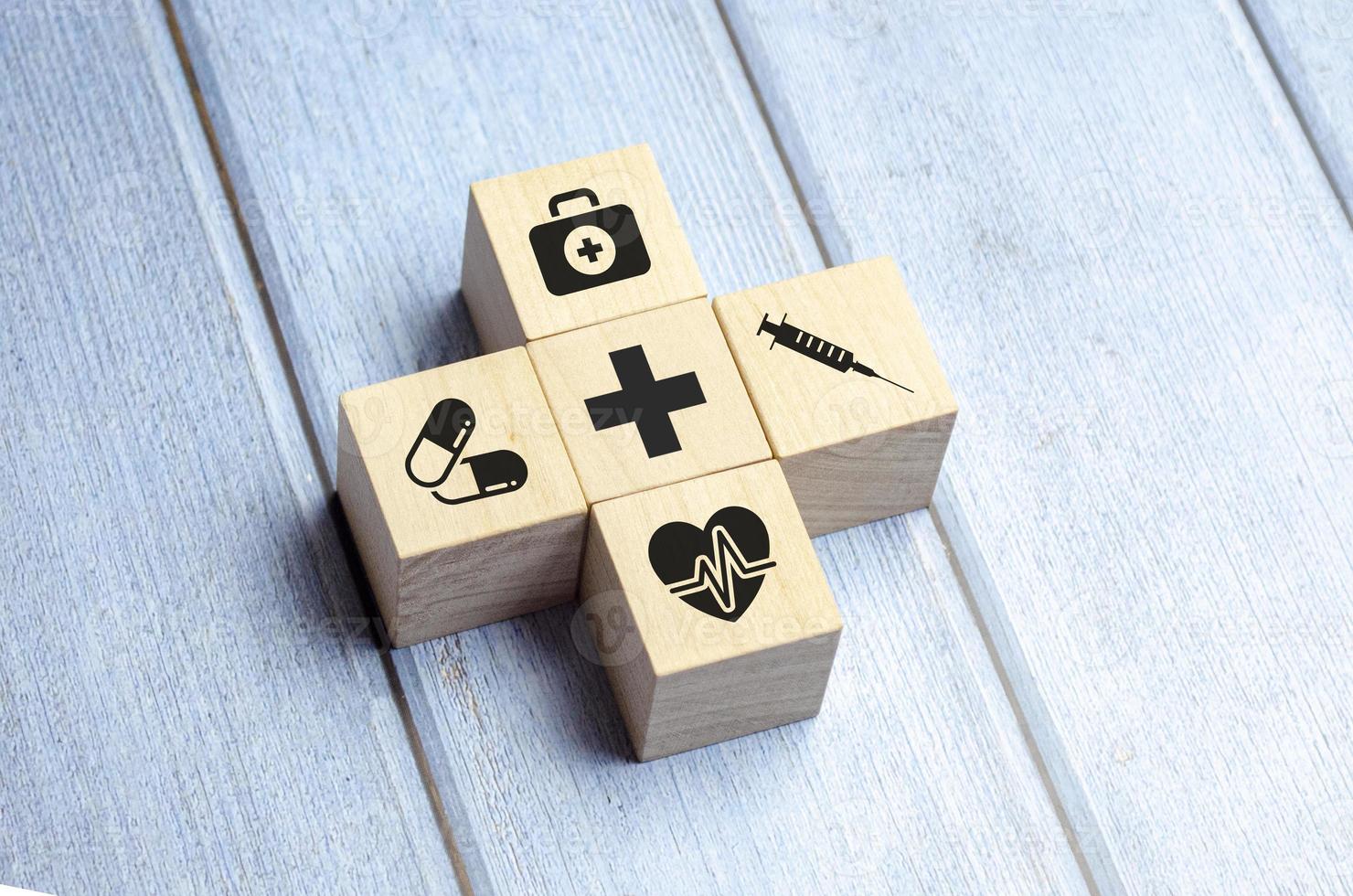 wooden block arrangement with healthcare medical icons Maintenance photo