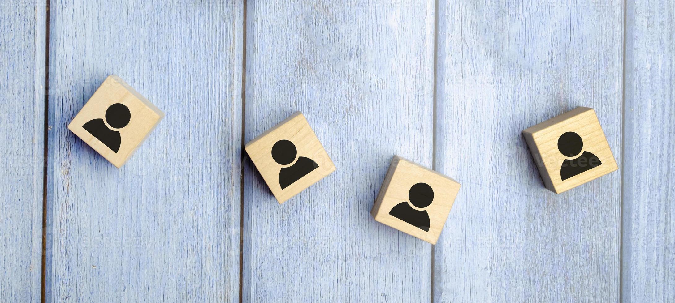 Wooden blocks on blue background. Teamwork, network and community concept. photo