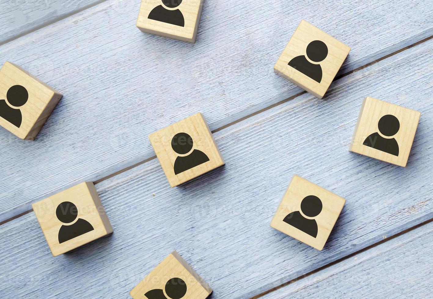 Wooden blocks on blue background. Teamwork, network and community concept. photo