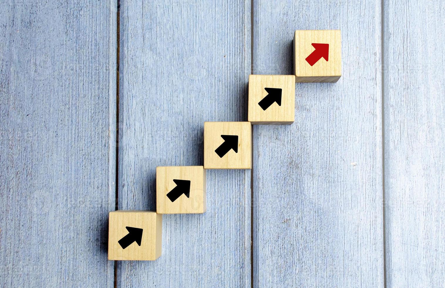wooden blocks stacking as step stair with arrow up, Business growth success process concept, copy space photo
