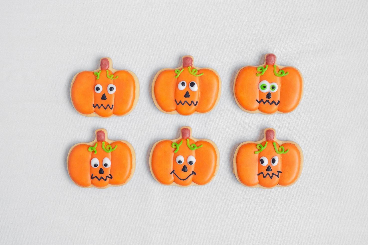 Happy Halloween day with funny Cookies, different Pumpkin biscuits on table background. Trick or Threat, Hello October, fall autumn, Traditional, party and holiday concept photo