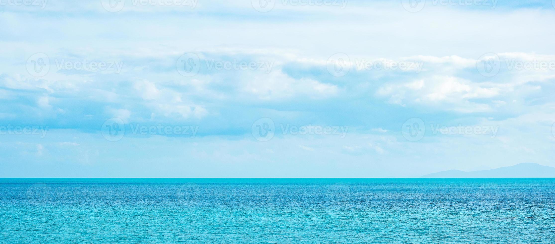 beautiful ocean and blue sky background. Relaxing, summer,  travel, holiday and vacation concept photo