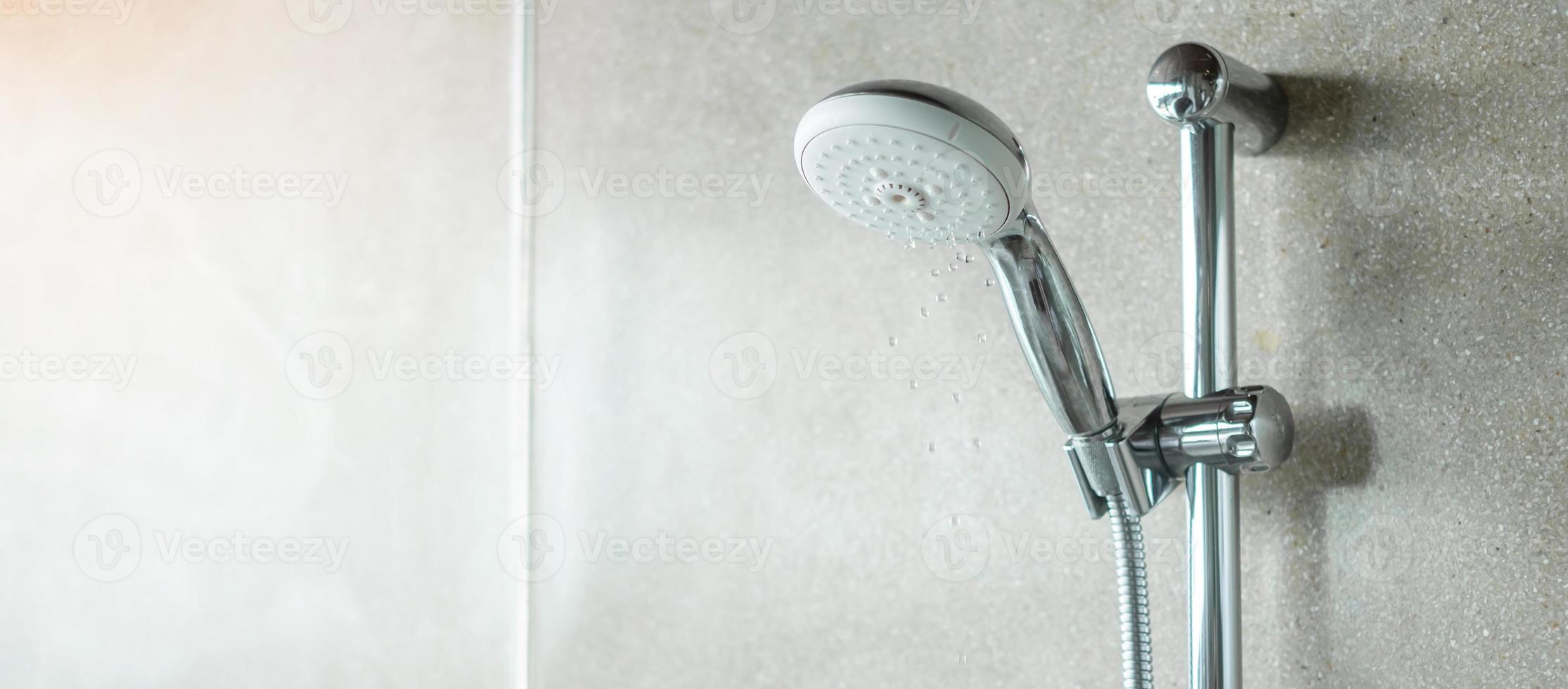 shower head with wall background in modern bathroom photo