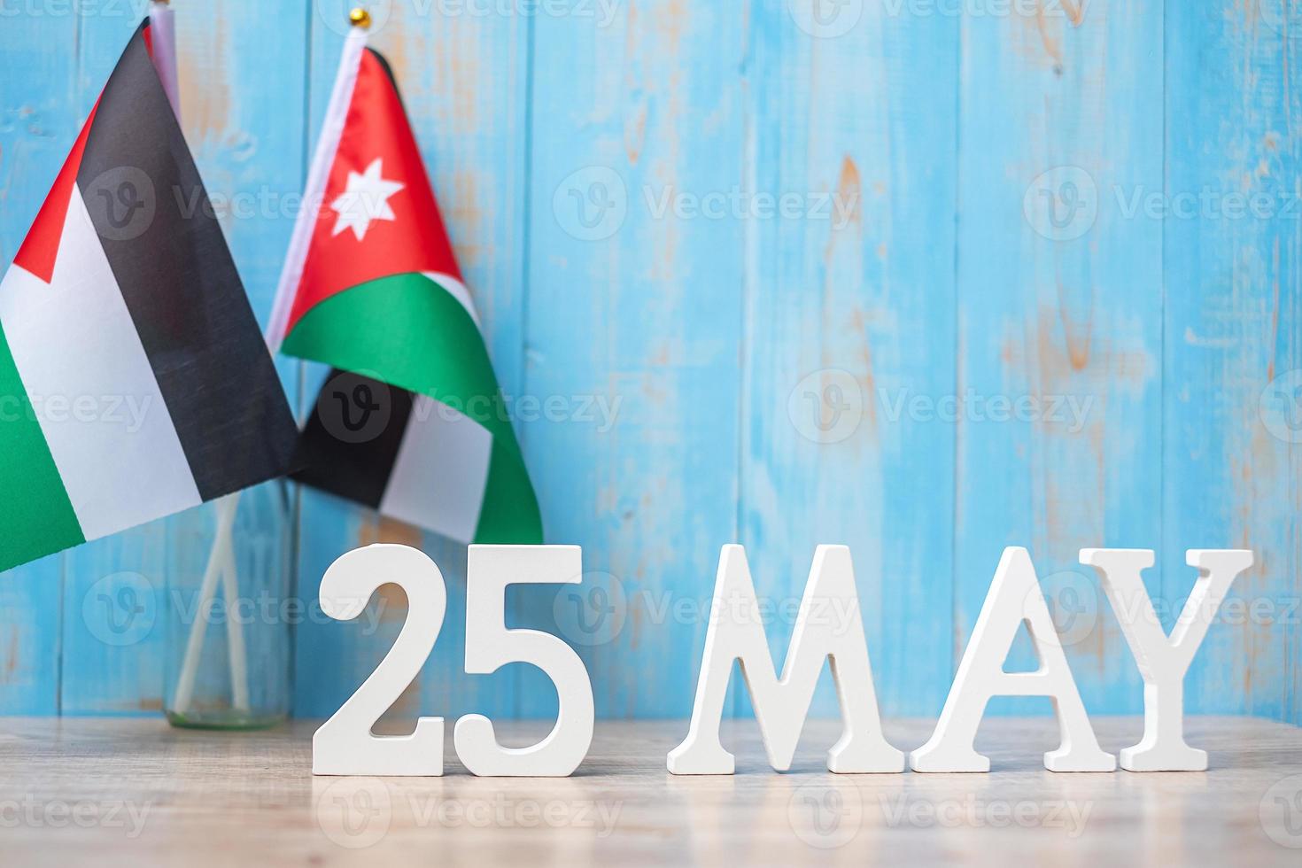 Wooden text of May 25th with Jordan flags. Jordan Independence day and happy celebration concepts photo