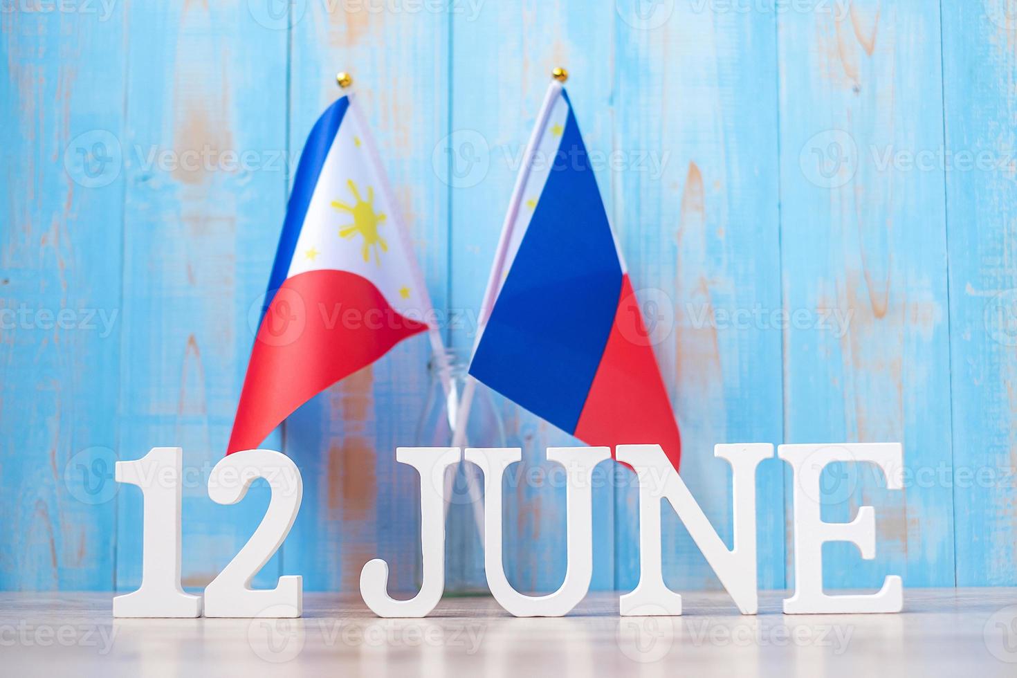 Wooden text of June 12th with Philippines flags. Philippines Independence day and happy celebration concepts photo