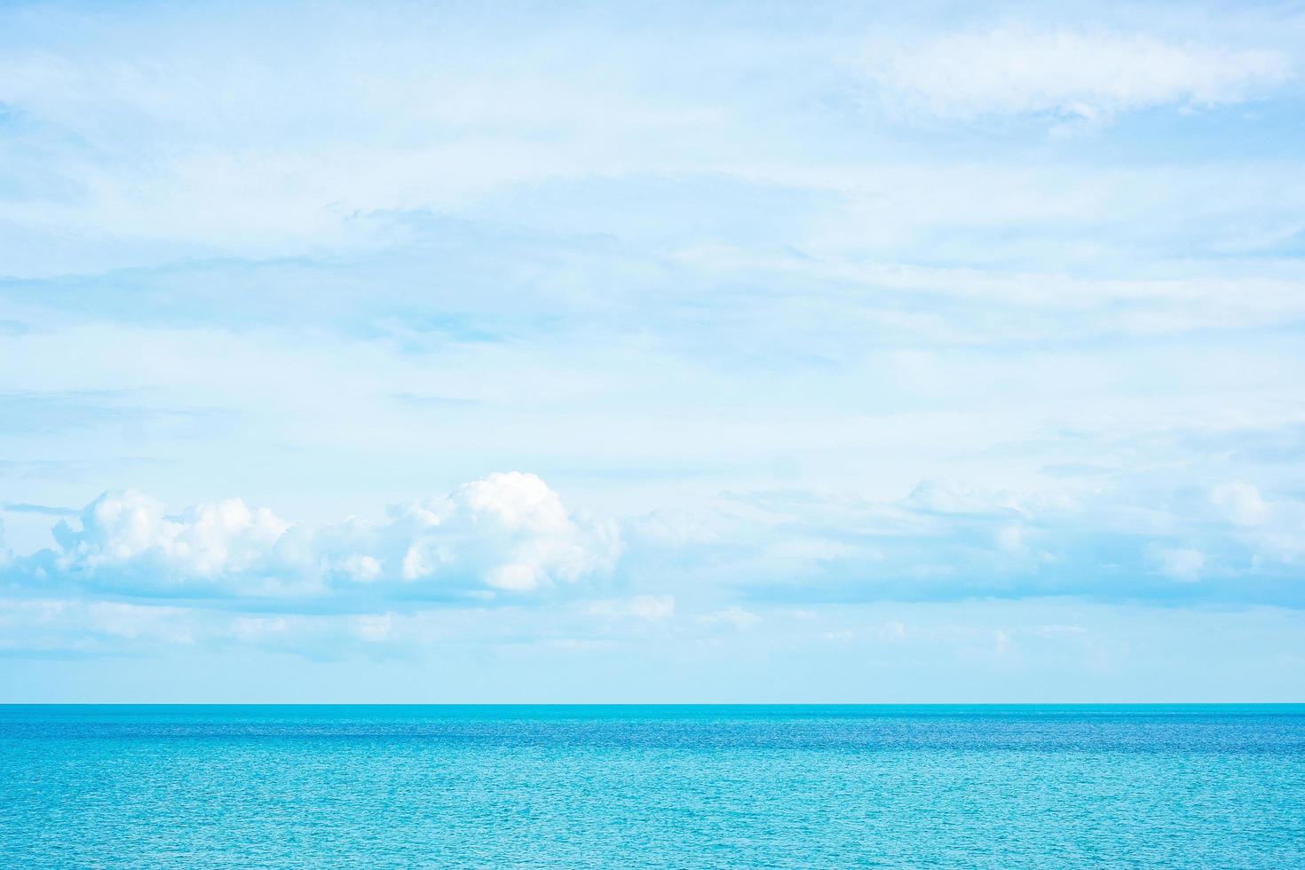 beautiful ocean and blue sky background. Relaxing, summer,  travel, holiday and vacation concept photo