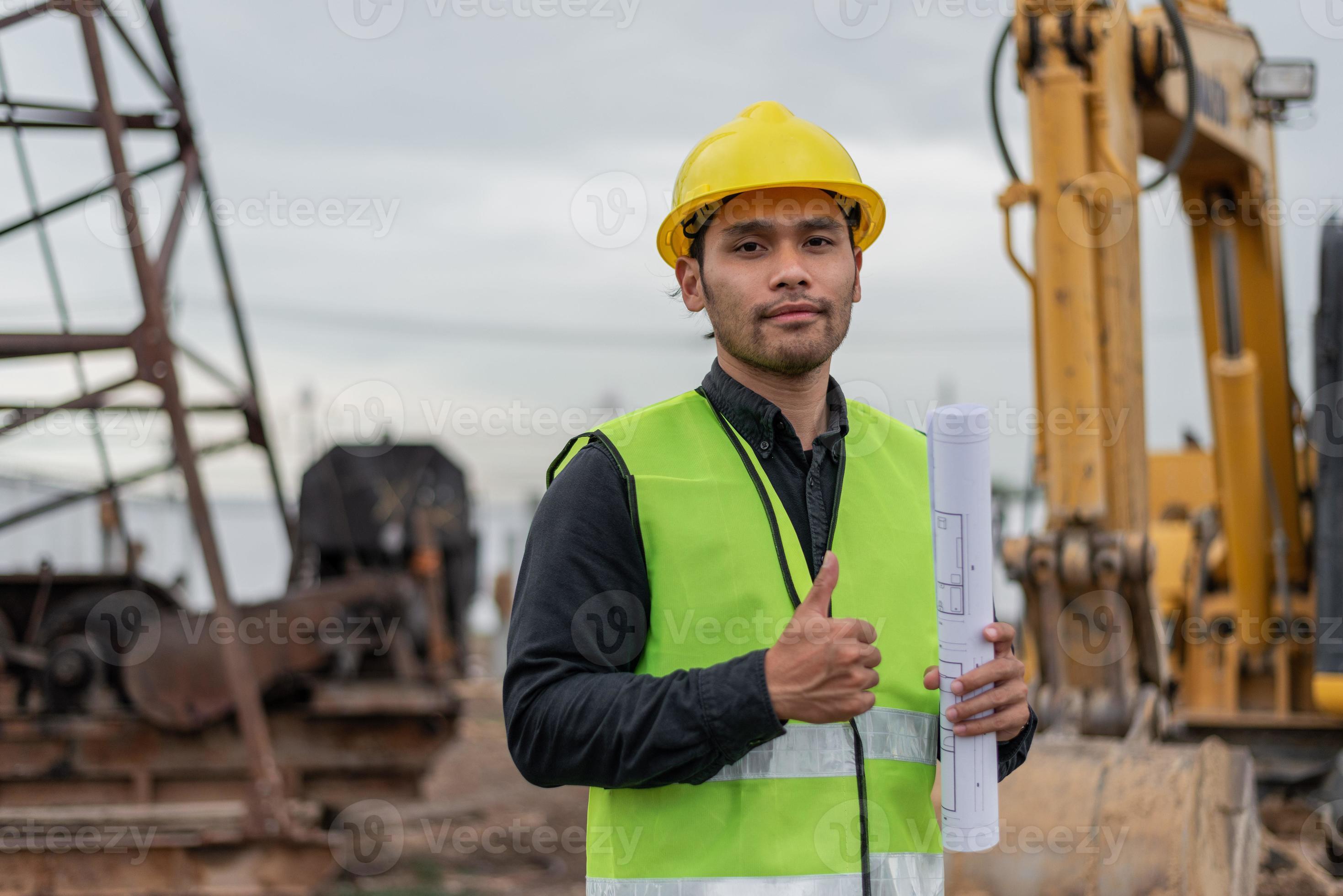 engineer man working in building site. Asian worker man working in