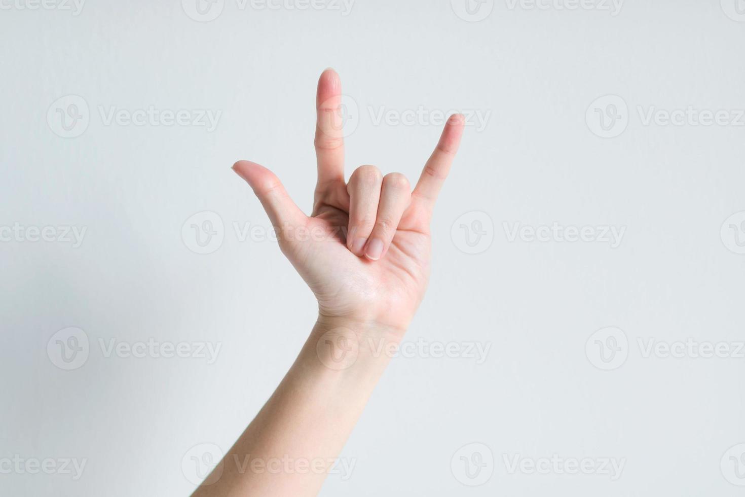 Hand signs meaning I love you. photo