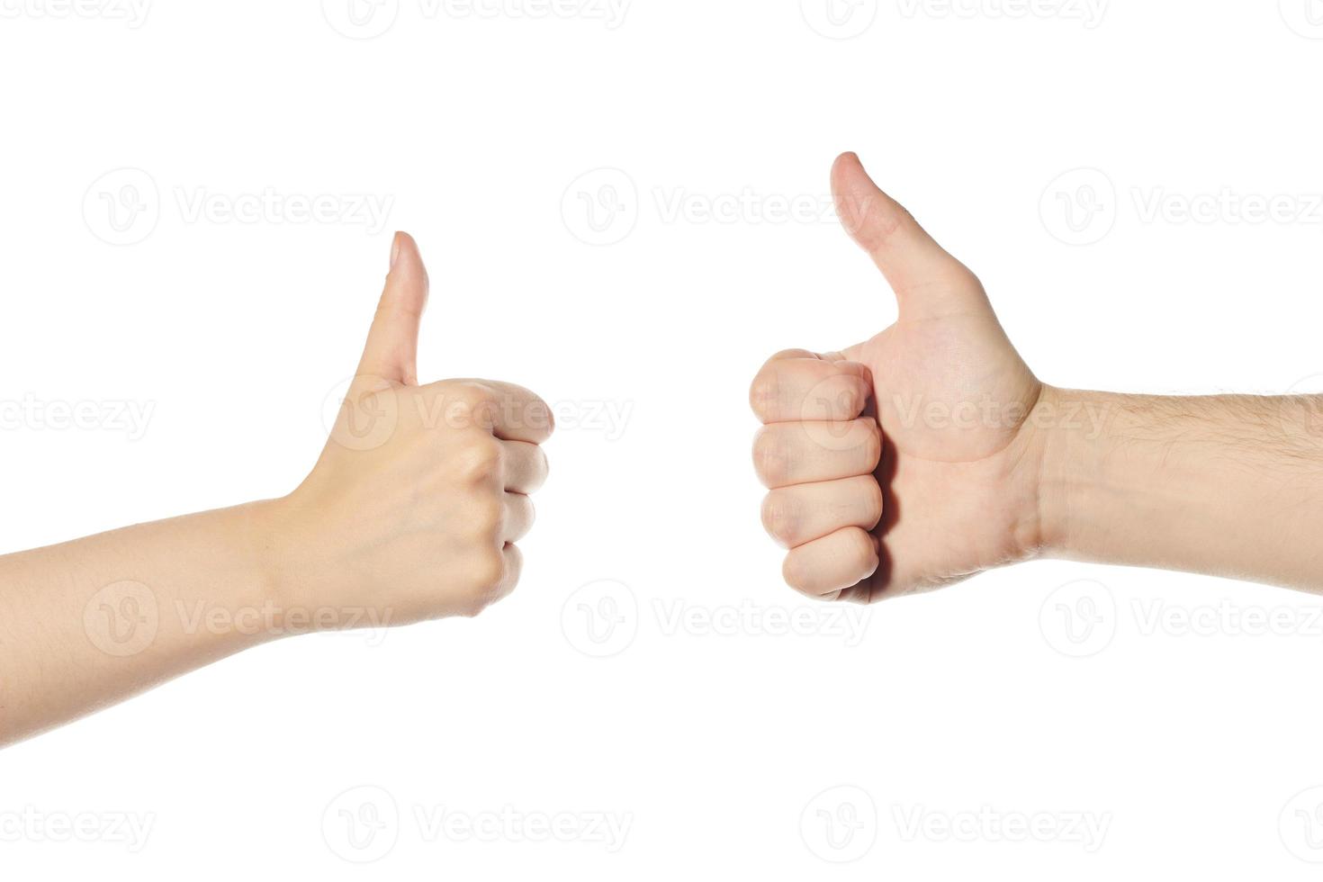 Hands with thumb up signal photo