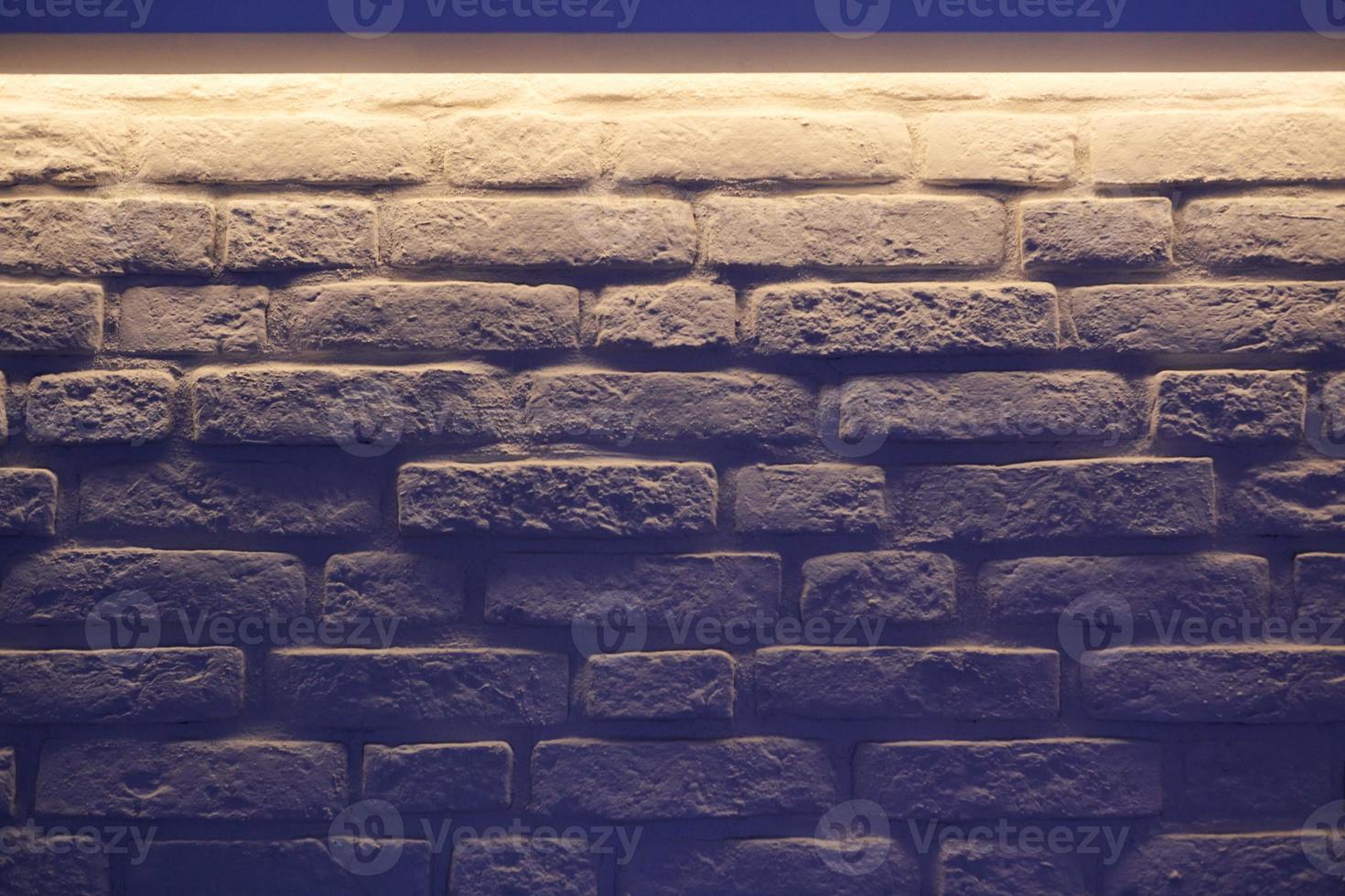 Brick wall indigo lighting photo