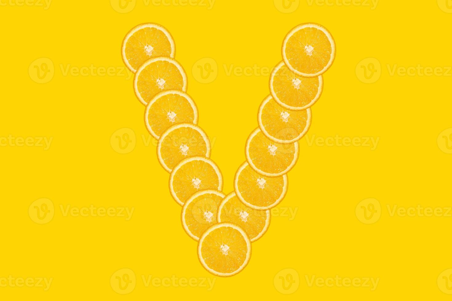 Orange alphabet - letter V photo