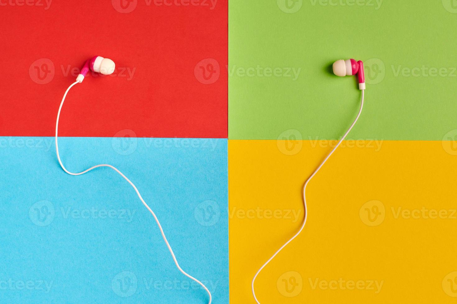 Red, green, blue, yellow paper colours. Audio software concept photo