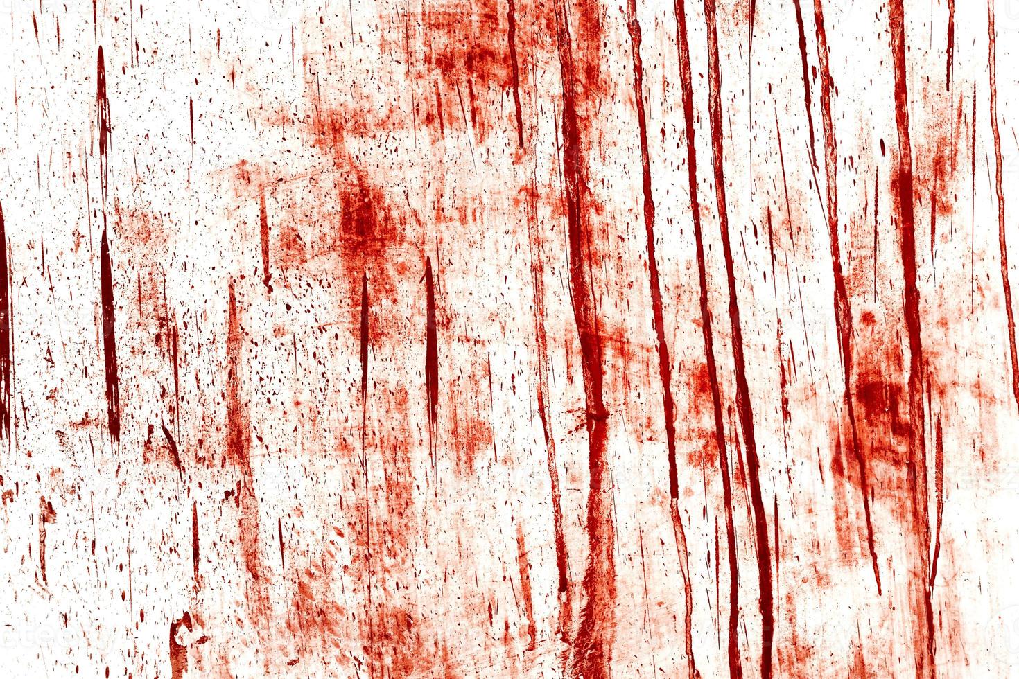 fondo rojo, pared sangrienta aterradora. pared blanca con salpicaduras de sangre para el fondo de halloween. foto