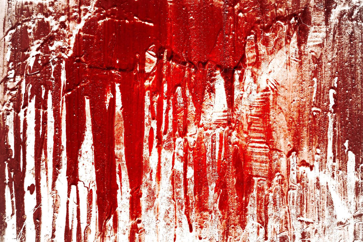 pared sangrienta de miedo. pared blanca con salpicaduras de sangre para el fondo de halloween. foto