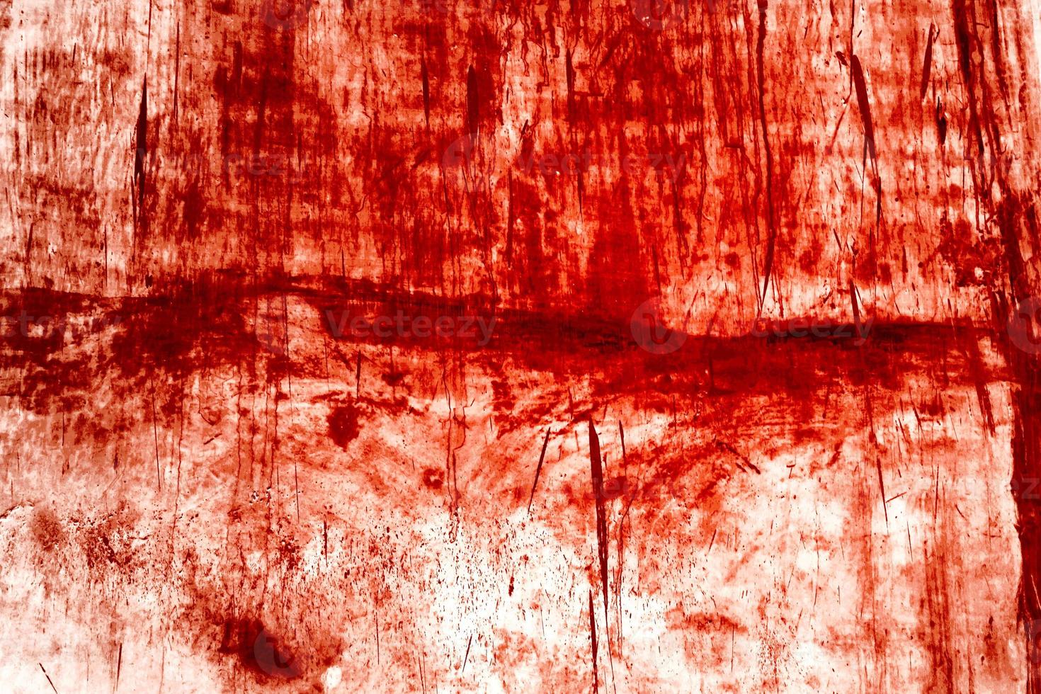 fondo rojo, pared sangrienta aterradora. pared blanca con salpicaduras de sangre para el fondo de halloween. foto