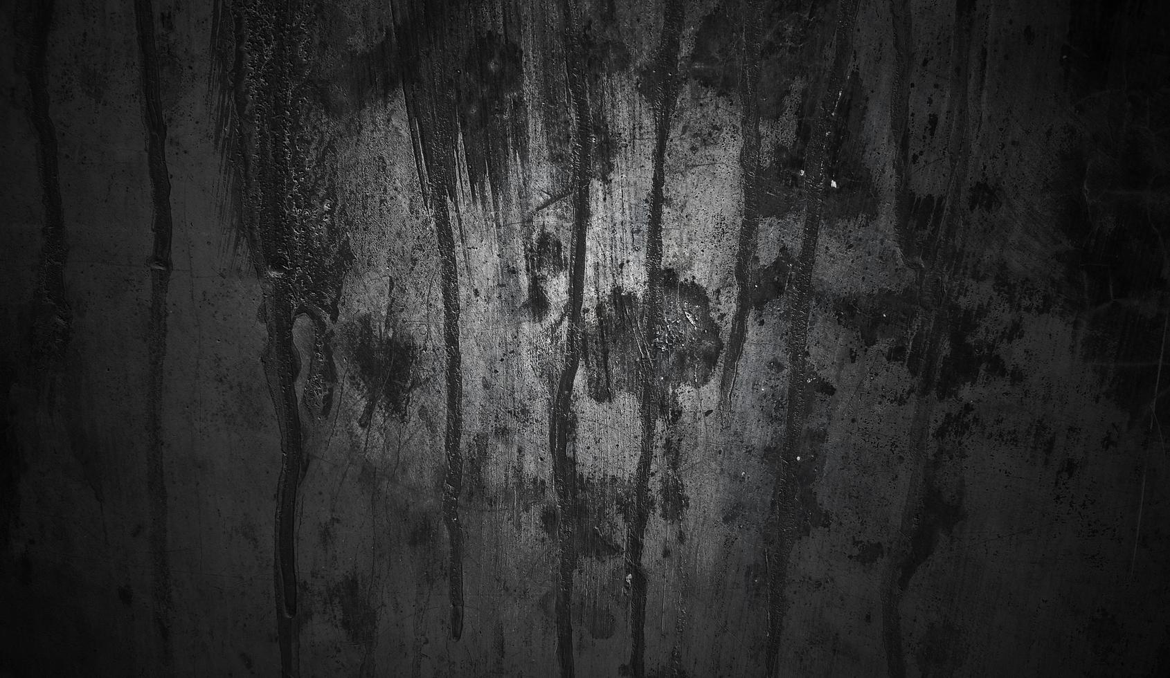 concepto de fondo de halloween de pared oscura y negra. hormigón negro polvoriento para el fondo. textura de cemento de terror foto