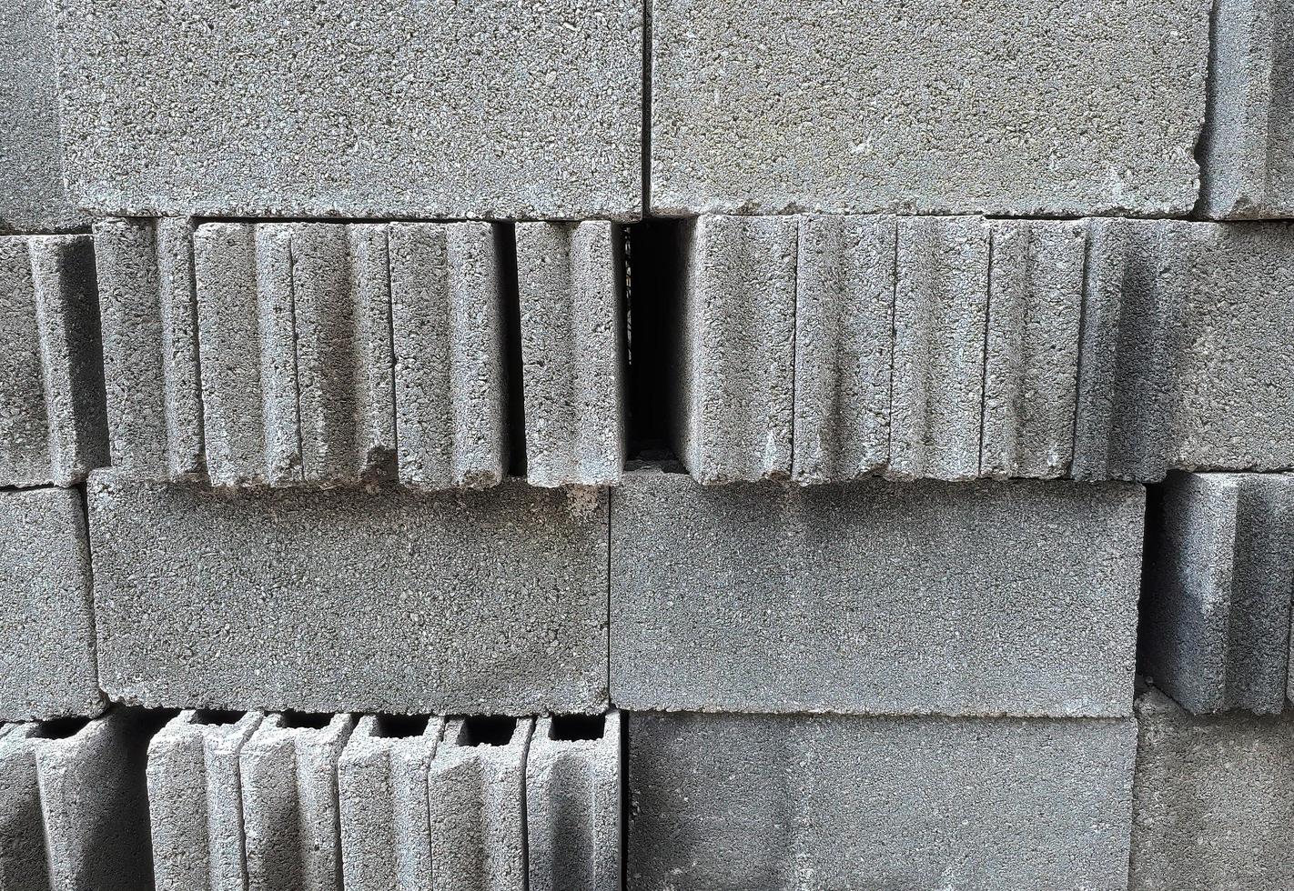 Close up construction material Concrete block stacked in grey color photo