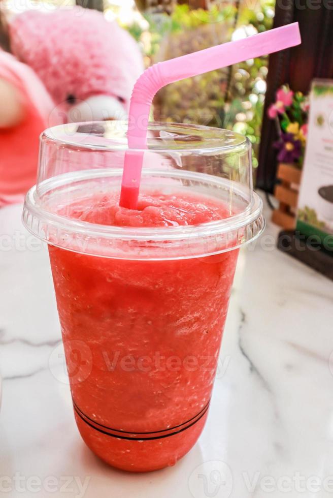 Flesh Watermelon Smoothie on the table photo