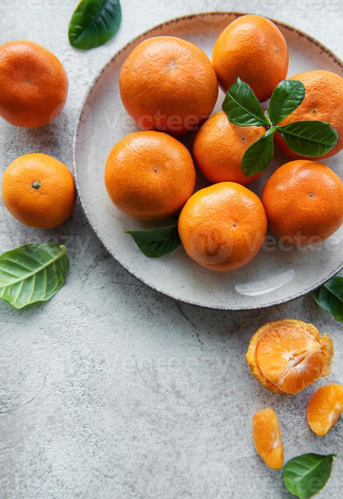 Fresh citrus fruits tangerines, oranges photo