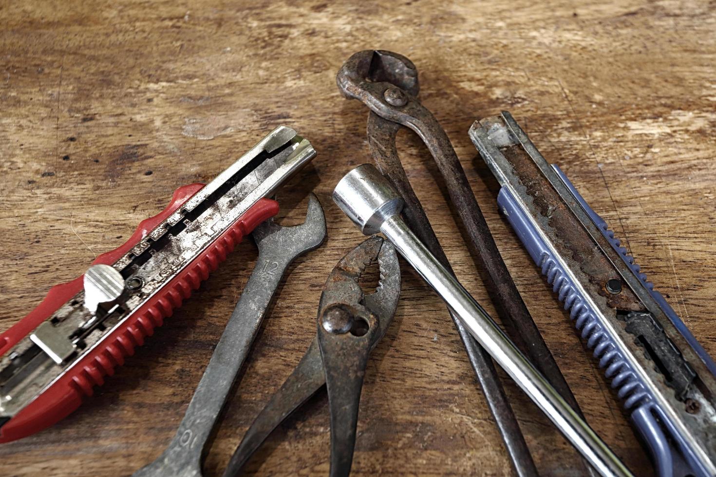 Old tools on a wooden table photo