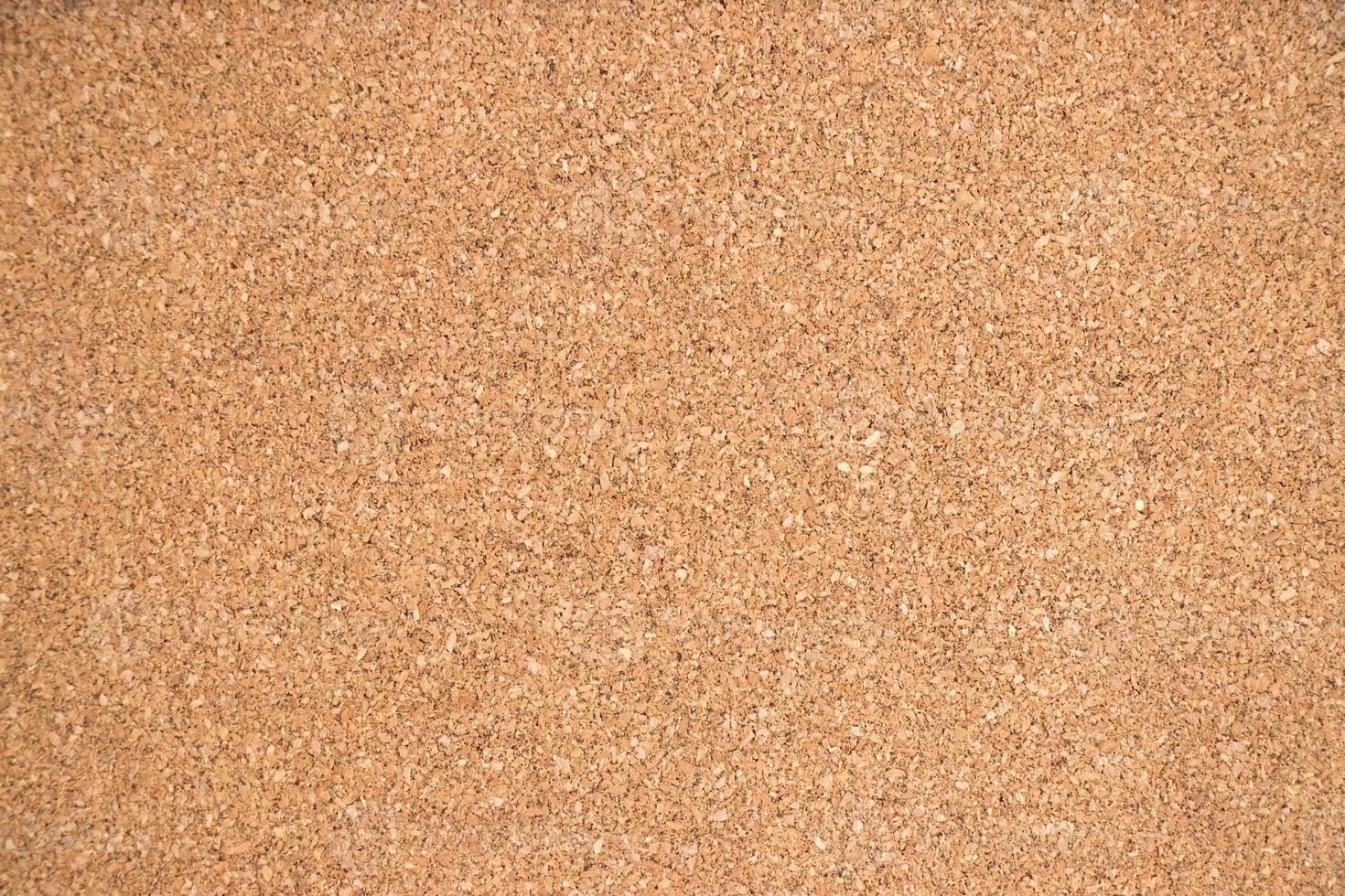 Closed up of brown cork board texture background photo