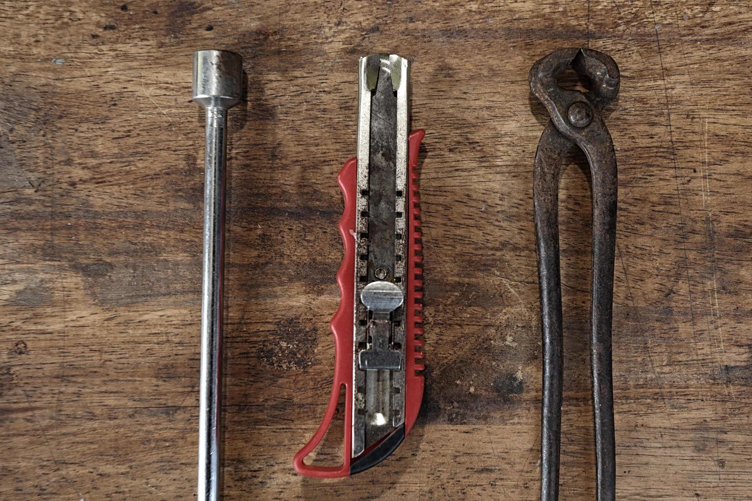 Old tools on a wooden table photo