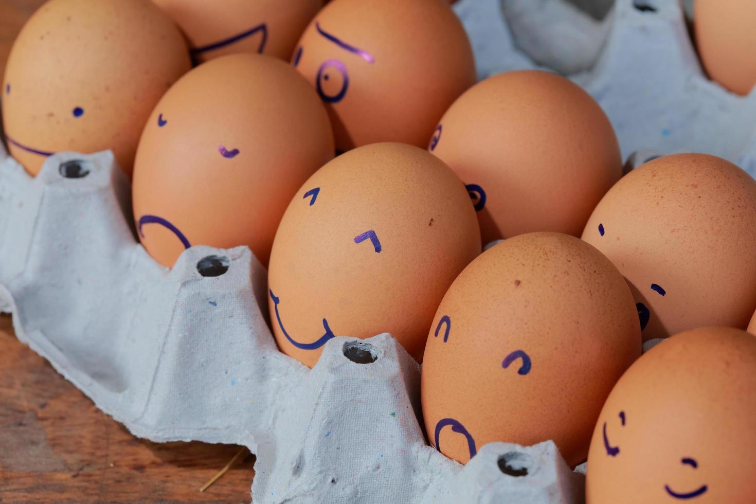 Emotion of fresh eggs  on a straw. photo