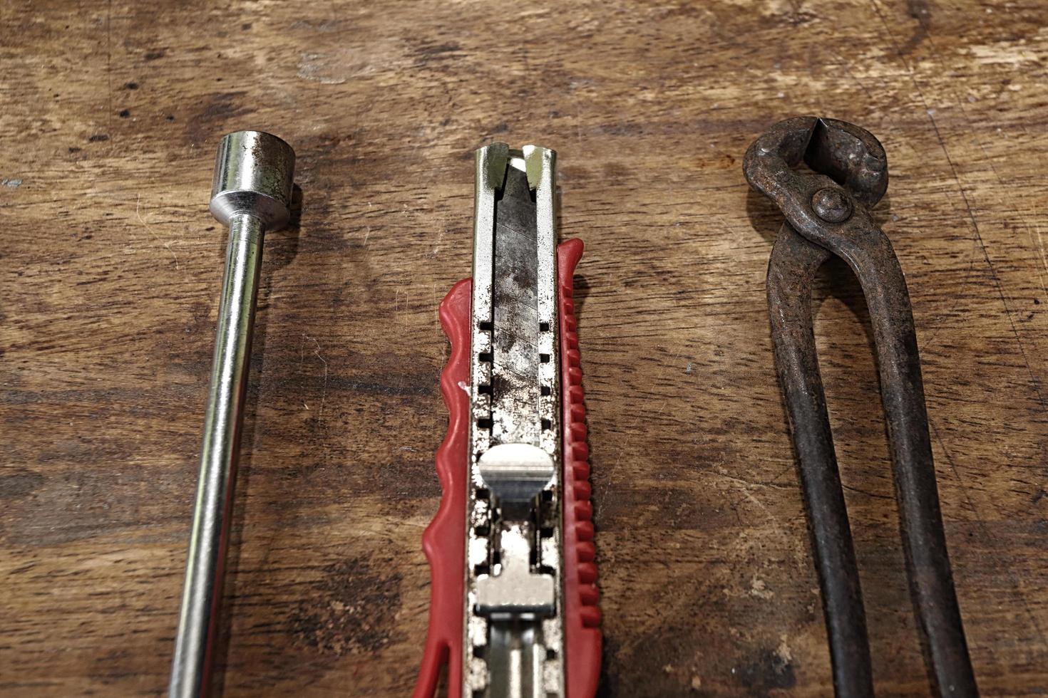 Old tools on a wooden table photo