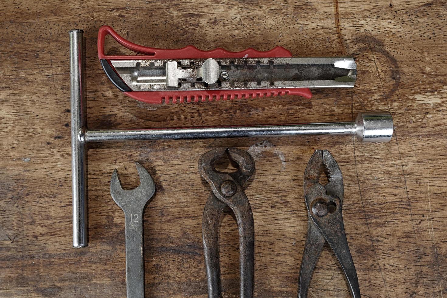 Old tools on a wooden table photo