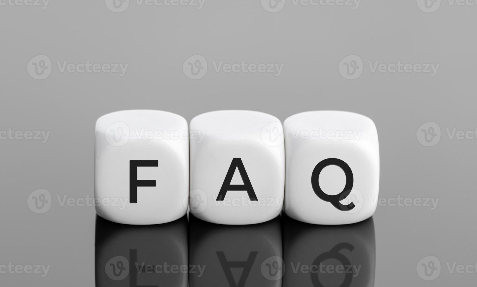 FAQ or frequently asked question concept. White blocks shape with text. Copy space photo