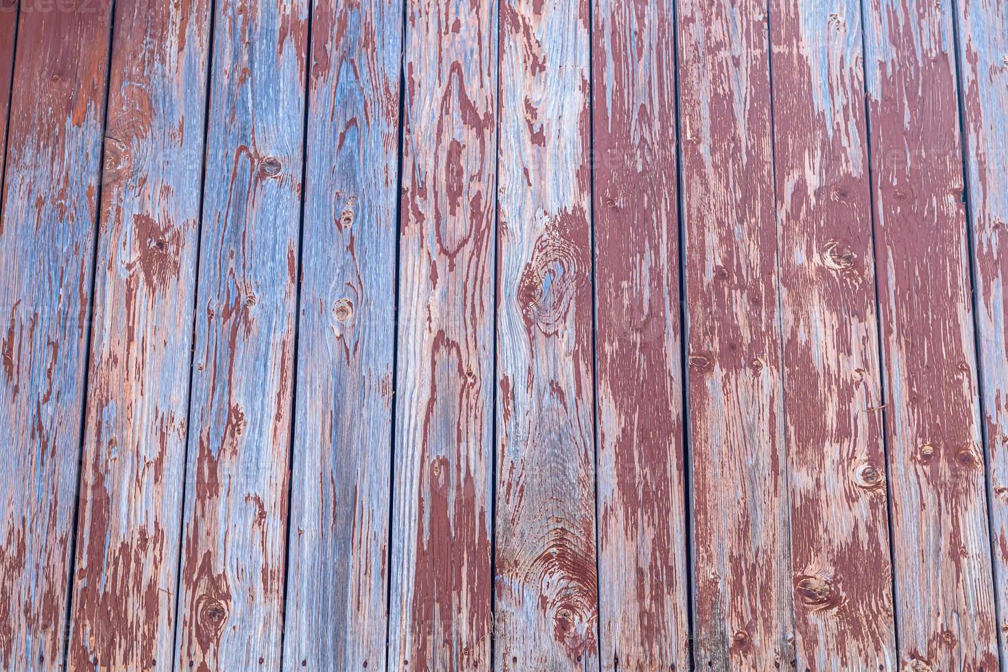 Diverse wooden surface. The walls of the houses are made of wood. Boards for background and construction photo