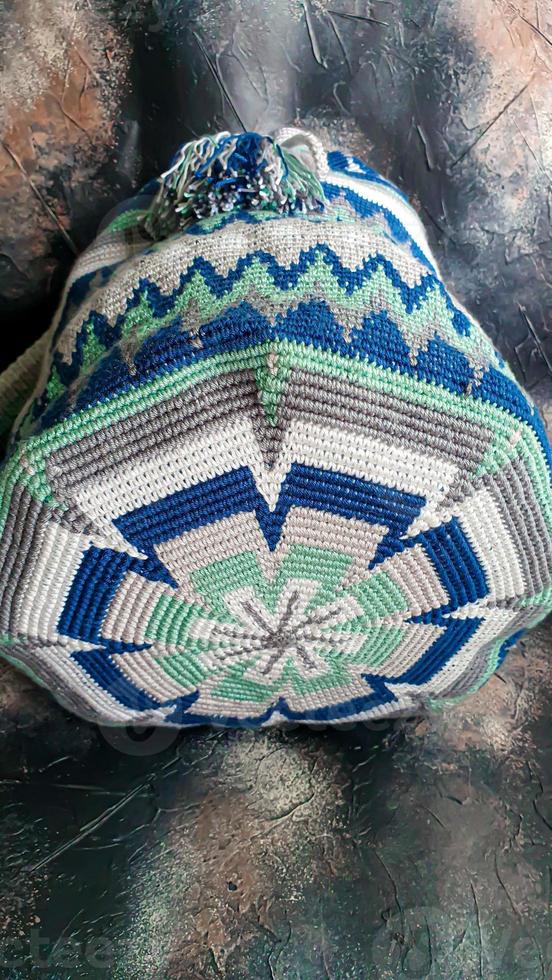 Handmade bags. Knitted from colored threads. Volumetric and comfortable to wear with a long handle. photo