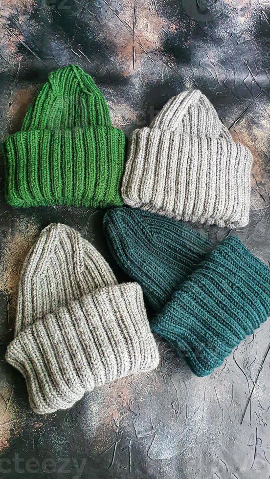 Handmade balaclava with Ukrainian symbols. Knitted from gray and green threads. Warms, reliably saves from the cold. photo