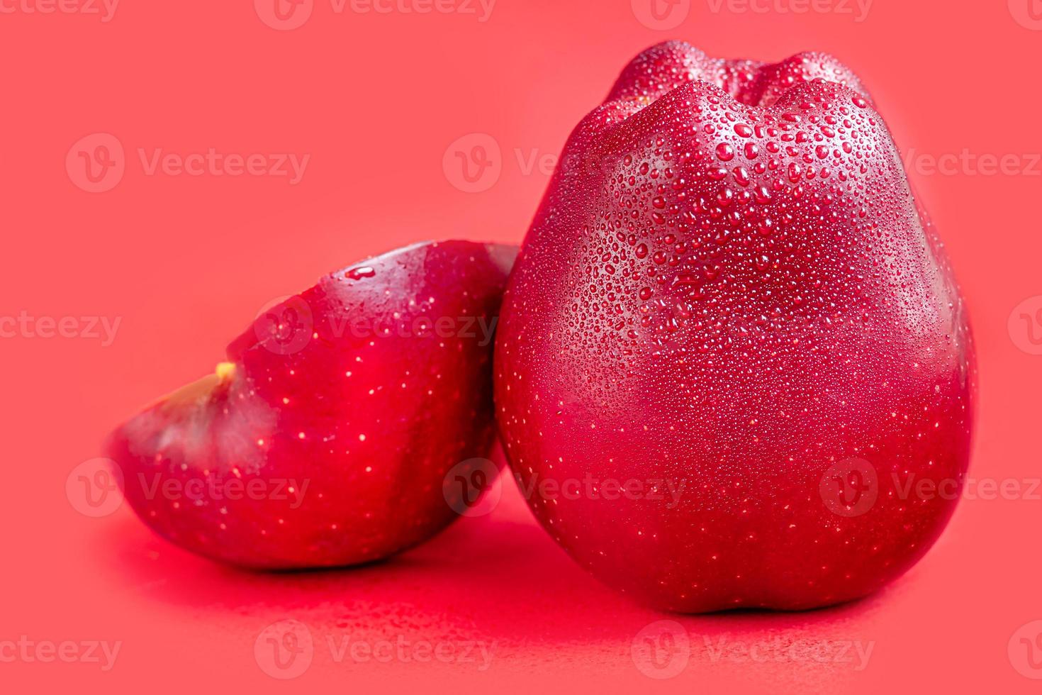 Red apples on a colored background. Selective focus. Harvesting. Healthy food. photo