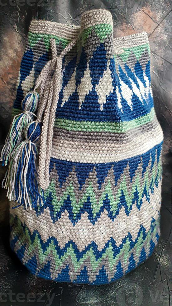 Handmade bags. Knitted from colored threads. Volumetric and comfortable to wear with a long handle. photo