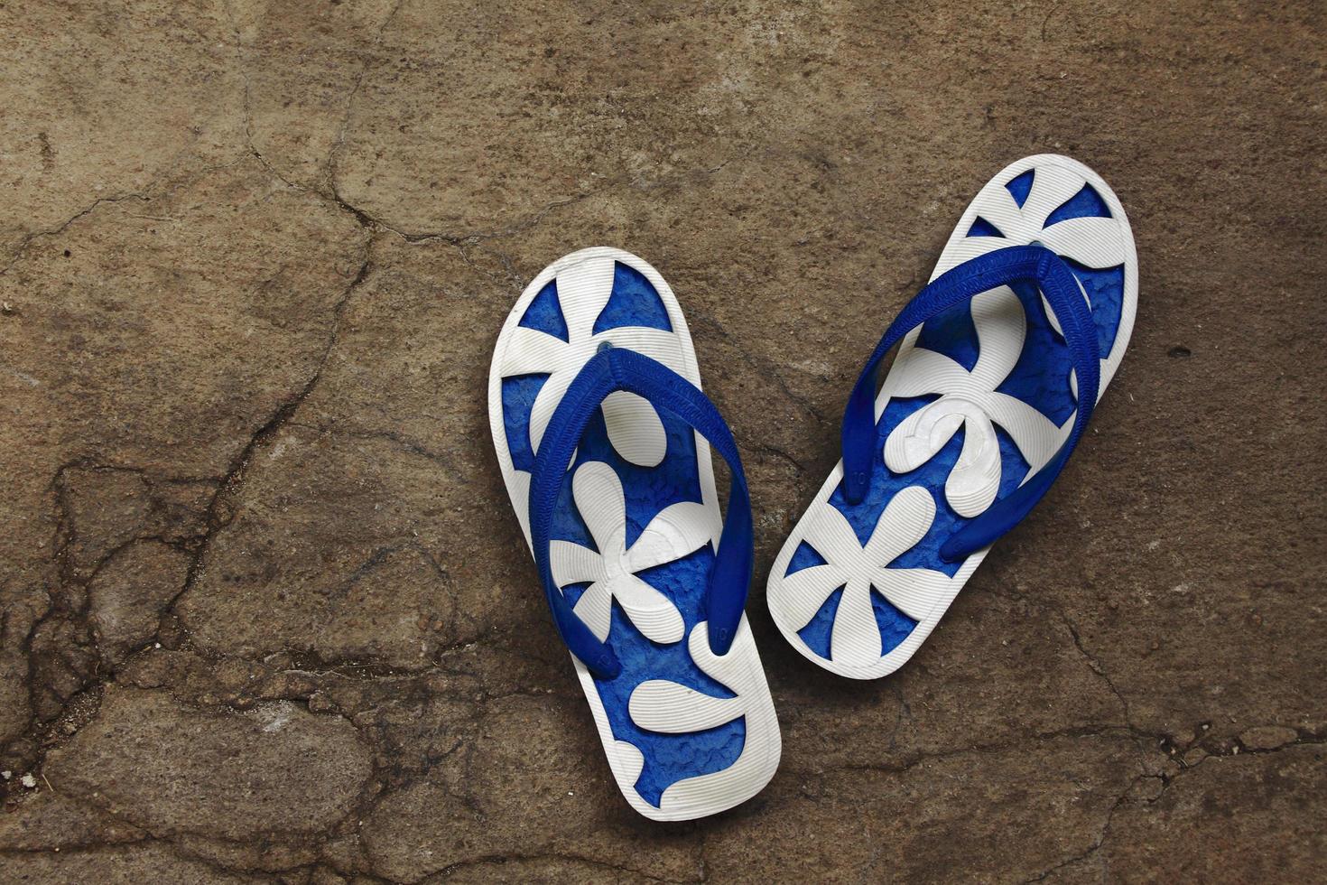 slipper on cement floor. photo