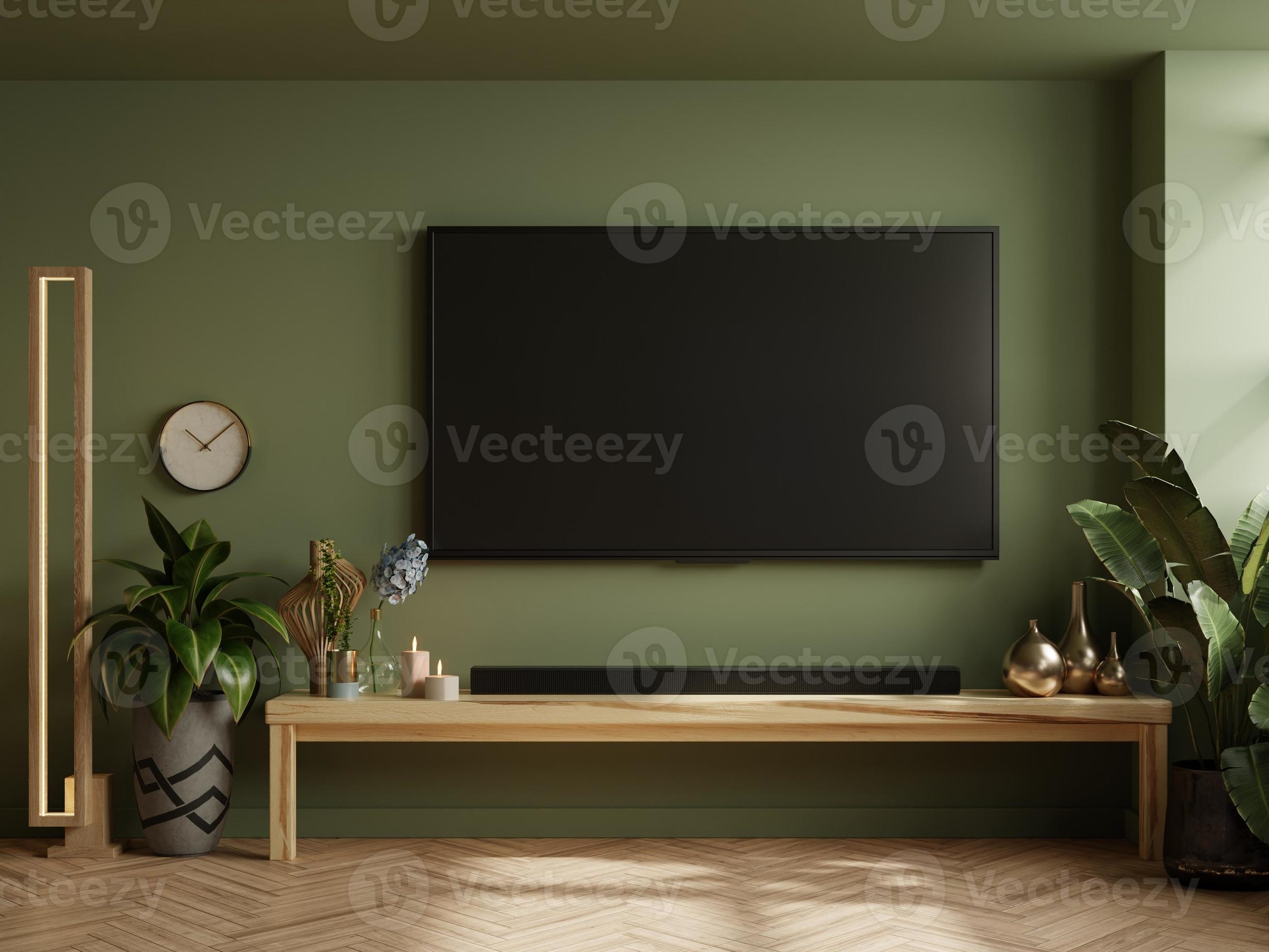 TV room in green wall background,Modern living room decor with a ...
