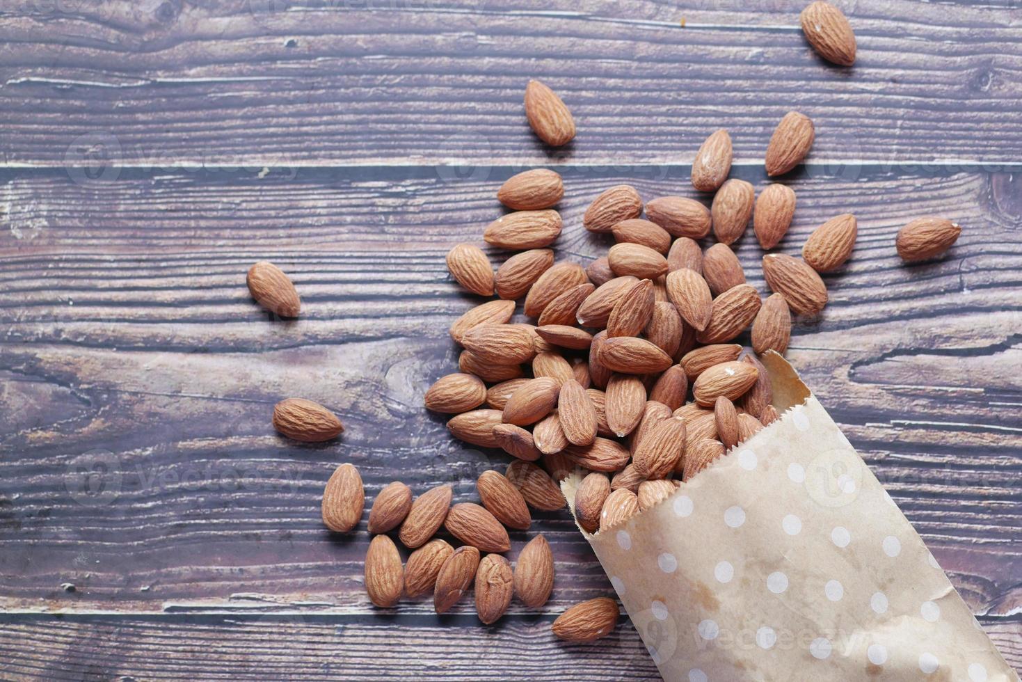 top view of almond nuts in a packet photo