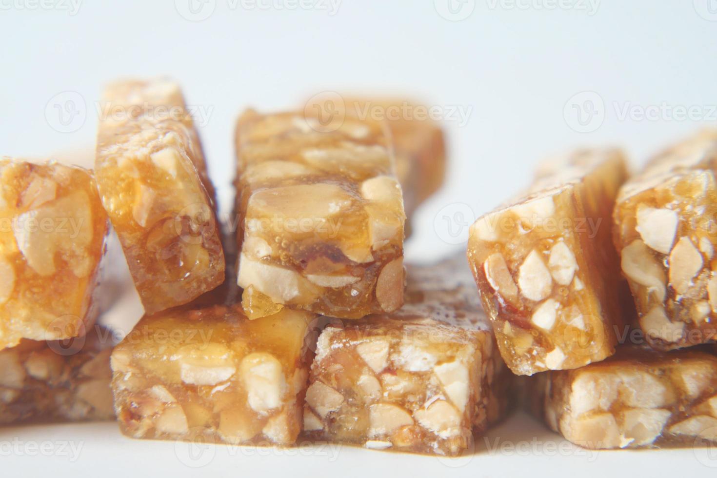 pea nuts sweet bar on white backgorund photo
