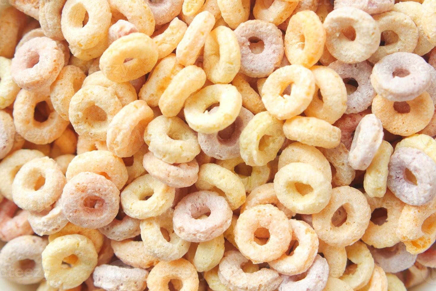 close up of colorful cereal corn flakes in a bowl photo