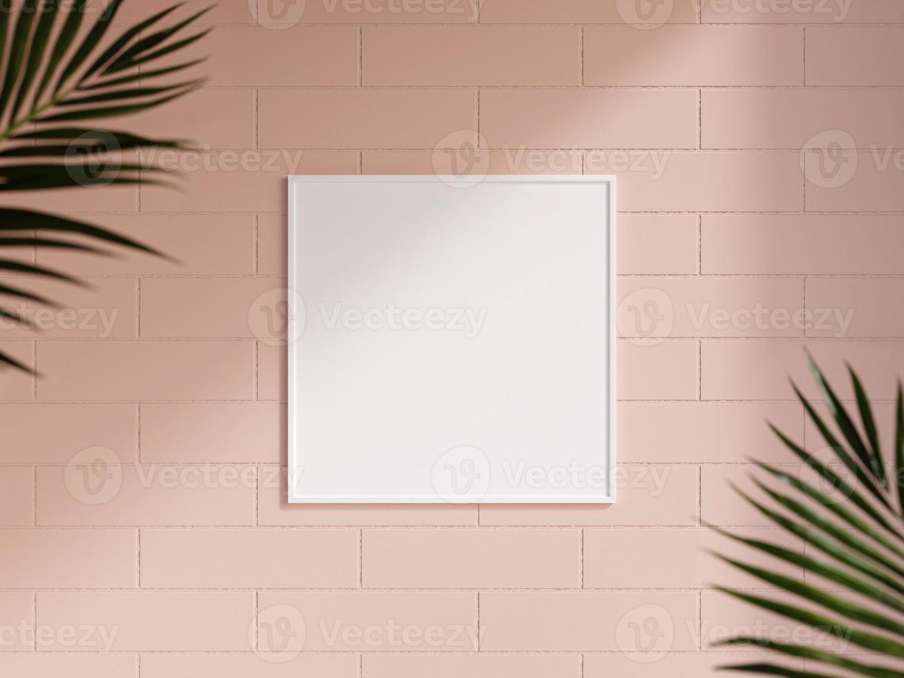 Clean and minimalist front view square white photo or poster frame mockup hanging on the brick wall with blurry plant. 3d rendering.