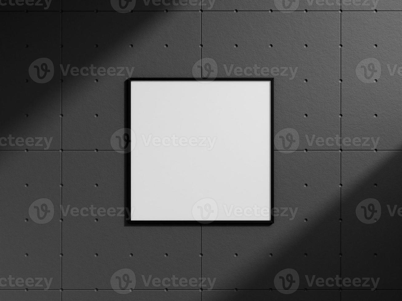 Clean and minimalist front view square black photo or poster frame mockup hanging on the industrial brick wall with shadow. 3d rendering.