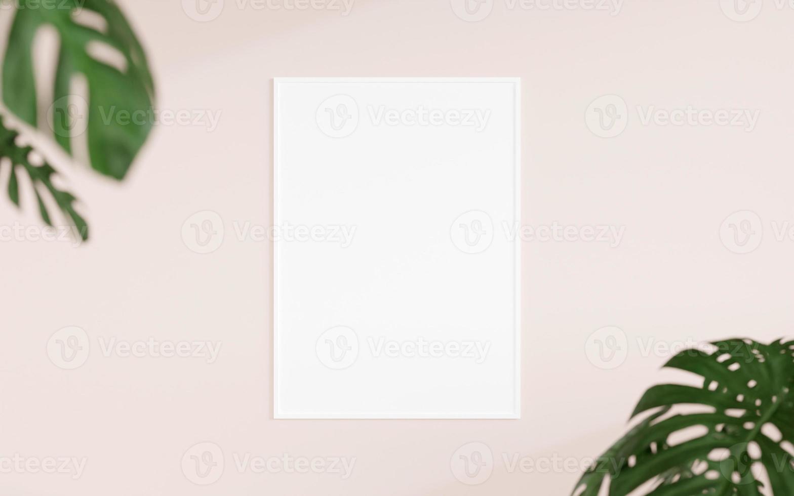 Clean and minimalist front view vertical white photo or poster frame mockup hanging on the wall with blurry plant. 3d rendering.