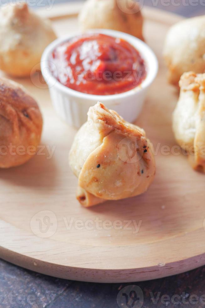 detail shot of a indian food singara on plate photo