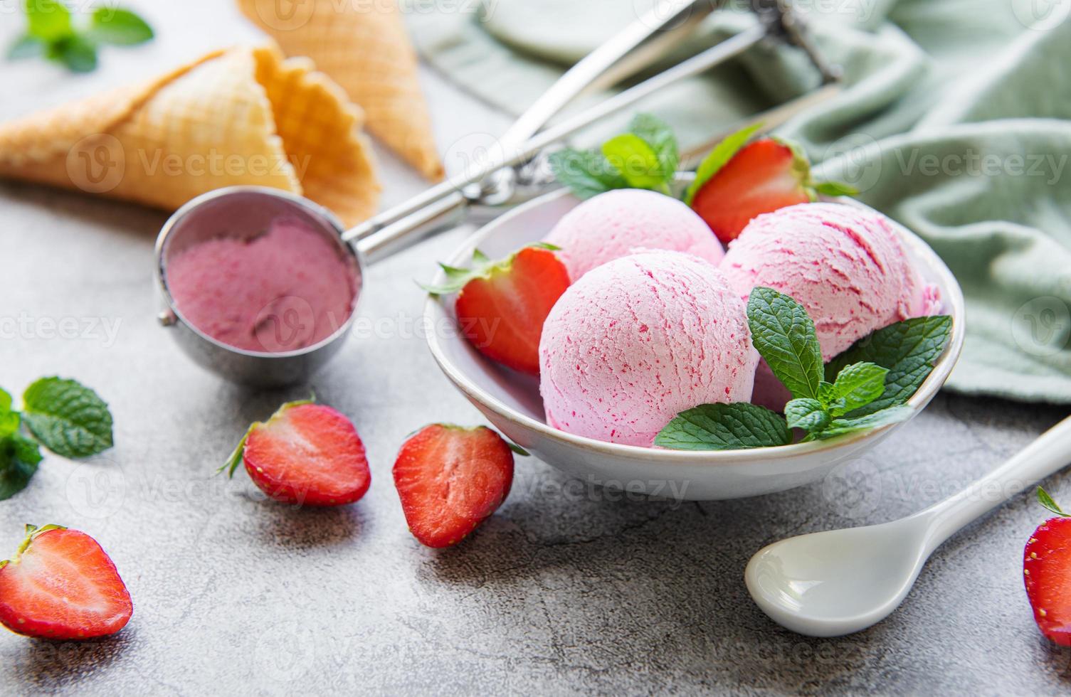 Homemade strawberry  ice cream with fresh strawberries photo