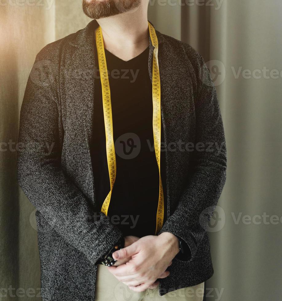 man with beard dressmaker designer photo