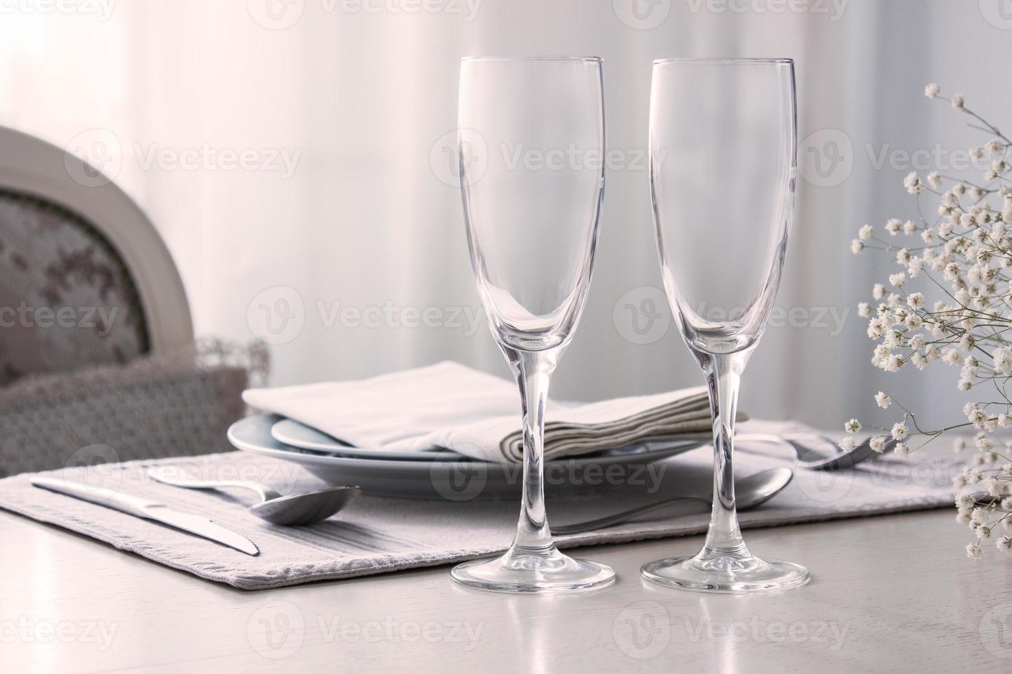 Pair of wine glasses, champagne flutes on the wedding table, Mockup photo