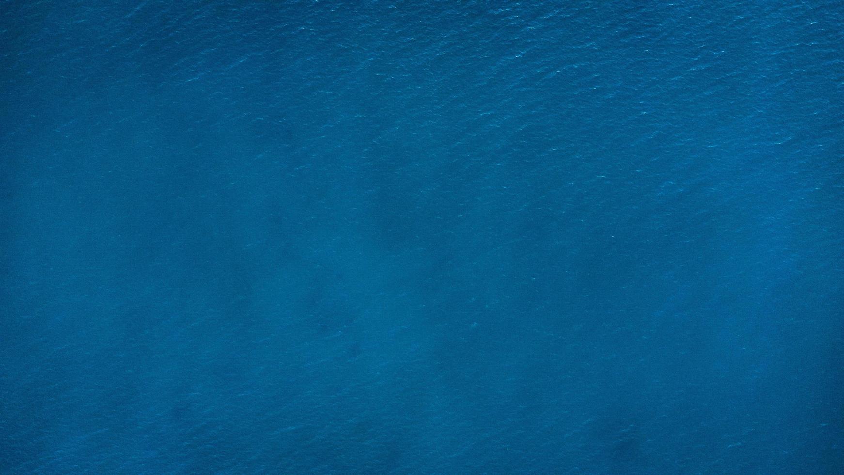 Blue water background photo