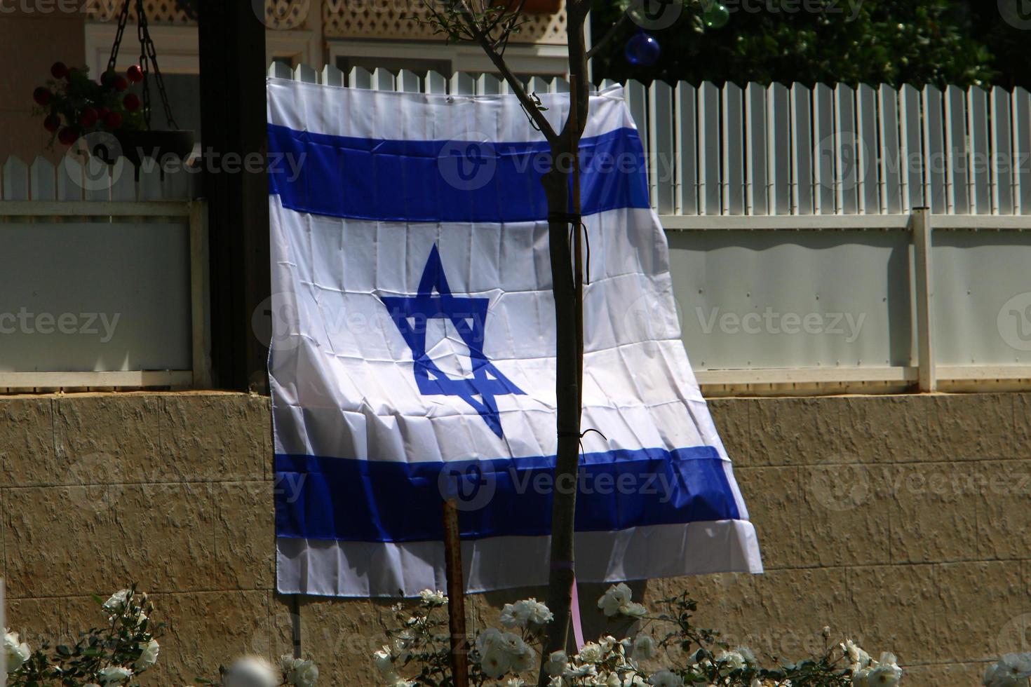 Israeli blue and white flag with the Star of David photo