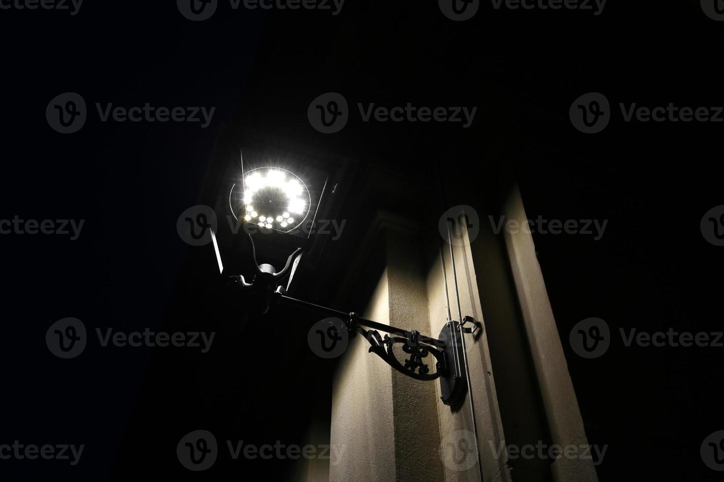 Lantern - a device for lighting the street at night photo